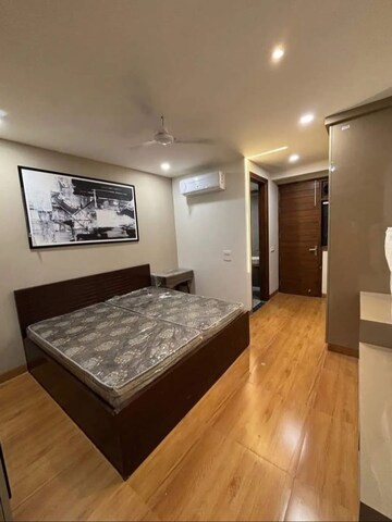 Bedroom in 1.5 BHK Builder Floor at Unitech Infospace, Sector 21 – for Rent