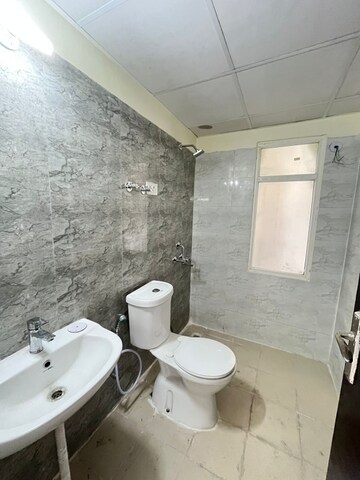 Bathroom in 2 BHK Apartment at Gaur City 2 - 12th Avenue, Sector 16c Greater Noida – for Rent