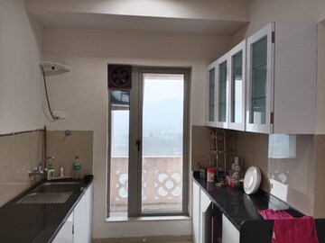 Kitchen in 3 BHK Apartment at Hiranandani Fortune City, New Panvel – for Rent
