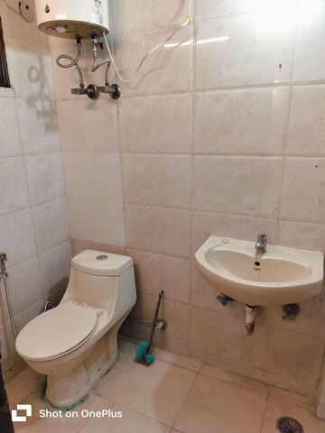 Bathroom in 3 BHK Apartment at Khirki Extension – for Rent