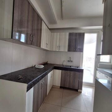 Kitchen in 3.5 BHK Apartment at Mahagun Mirabella, Sector 79 – for Rent