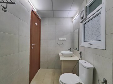 Bathroom in 2 BHK Apartment at Bhartiya Nikoo Homes, Thanisandra Main Road – for Sale
