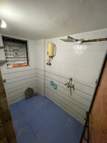 Bathroom in 2 BHK Apartment at Aakanksha Garden, Manpada – for Rent