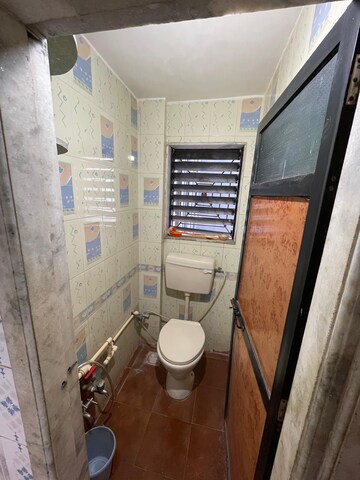 Bathroom in 2 BHK Apartment at Aakanksha Garden, Manpada – for Rent