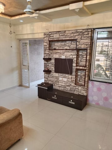 Living Room in 1 BHK Apartment at Dhankawade Patil Township, Dhankawadi – for Rent