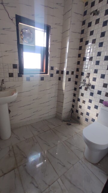 Bathroom in 2 BHK Builder Floor at Rajpur Khurd Extension – for Rent