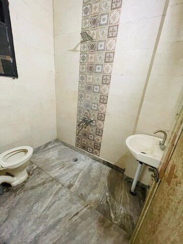 Bathroom in 1 BHK Apartment at Hargobind Enclave – for Rent