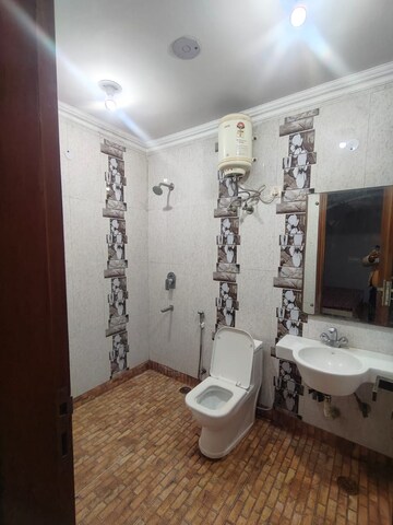 Bathroom in 3 BHK Apartment at Hargobind Enclave – for Rent