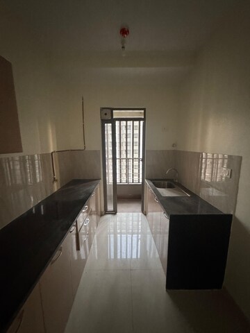Kitchen in 2 BHK Apartment at Kalpataru Paramount, Kapur Bawdi – for Rent