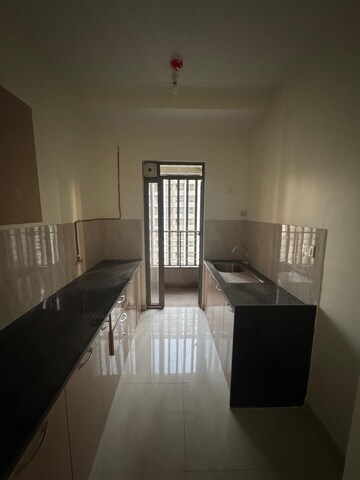 Living Room in 2 BHK Apartment at Kalpataru Paramount, Kapur Bawdi – for Rent