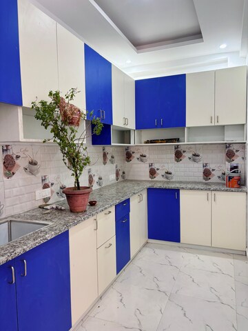 Kitchen in 4 BHK Villa at Omson Nature Valley, Sector 10 Greater Noida – for Sale