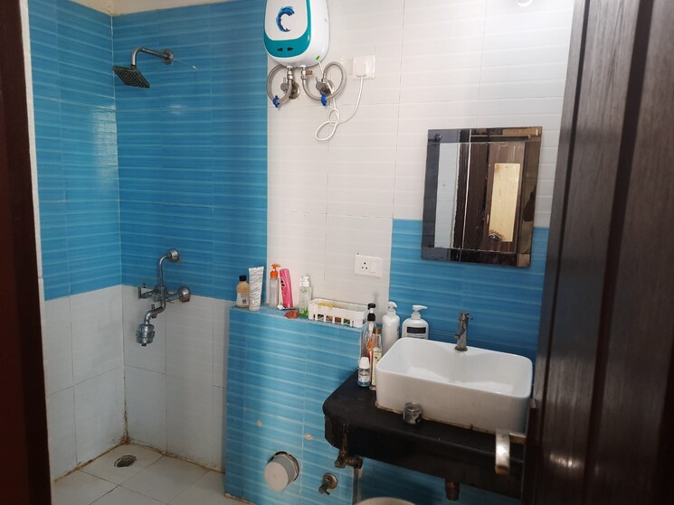 Bathroom, sikka-karmic-greens 3.5 Bedroom 1520 Sq.Ft. Apartment In Sector 78 Noida 8230596