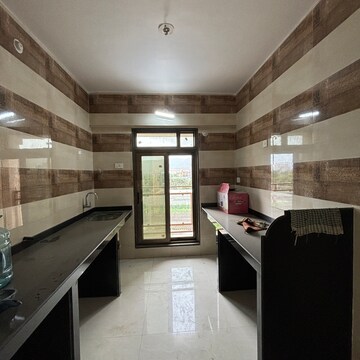 Kitchen in 2 BHK Apartment at National Harmony, Panvel Sector 15a – for Sale
