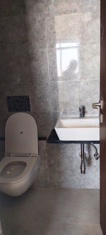 Bathroom in 1 BHK Apartment at Omkar Signet, Malad East – for Rent