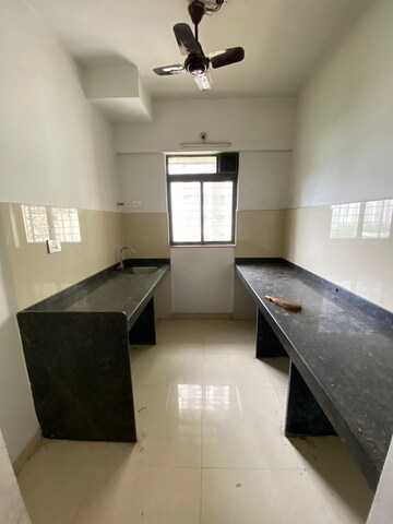 Kitchen in 1 BHK Apartment at Lodha Palava Downtown, Dombivli East – for Rent