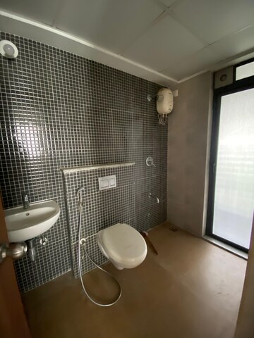 Bathroom in 1 BHK Apartment at Lodha Palava Downtown, Dombivli East – for Rent