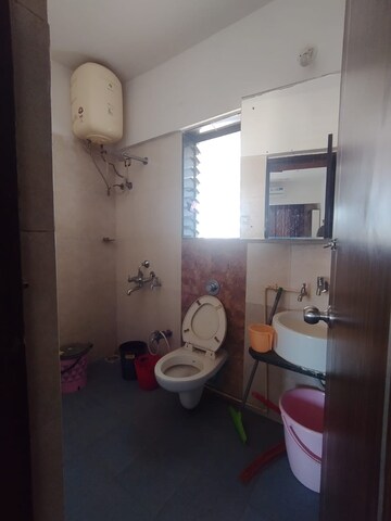 Bathroom in 2 BHK Apartment at Sudarshan Sky Garden, Ghodbunder Road – for Rent