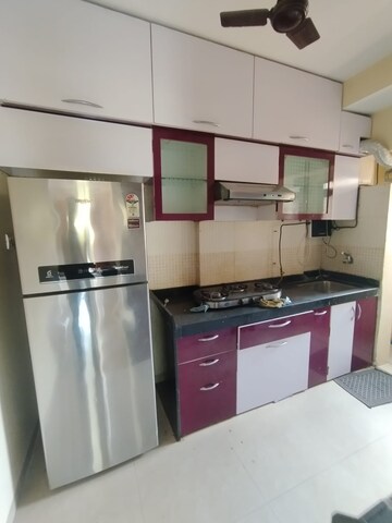 Kitchen in 2.5 BHK Apartment at Sudarshan Sky Garden, Ghodbunder Road – for Rent