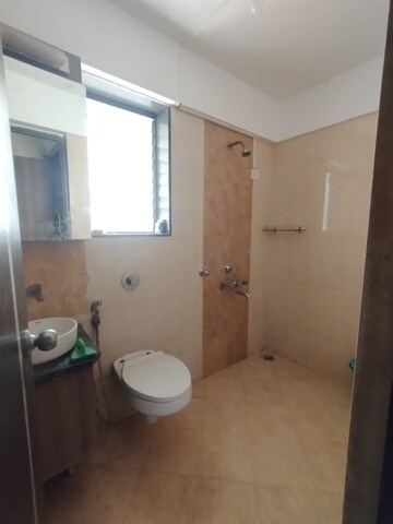 Bathroom in 2.5 BHK Apartment at Sudarshan Sky Garden, Ghodbunder Road – for Rent