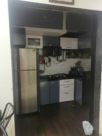Kitchen in 2 BHK Apartment at Cosmos Park, Ghodbunder Road – for Sale