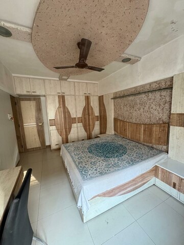 Master Bedroom in 2 BHK Apartment at NRI Complex Phase I, Seawoods Sector 58 – for Rent