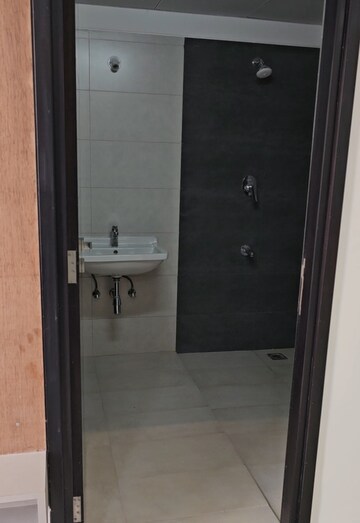 Bathroom in 3 BHK Apartment at Rajapushpa Eterna, Nanakramguda – for Rent
