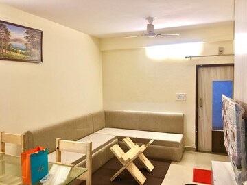 Living Room in 1.5 BHK Apartment at Patel Nagar – for Rent