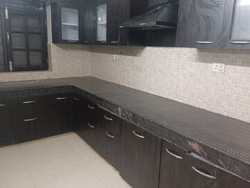 Kitchen in 2 BHK Apartment at Omega Orchid Heights, Faizabad Road – for Sale