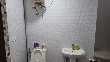 Bathroom in 2 BHK Apartment at Omega Orchid Heights, Faizabad Road – for Sale