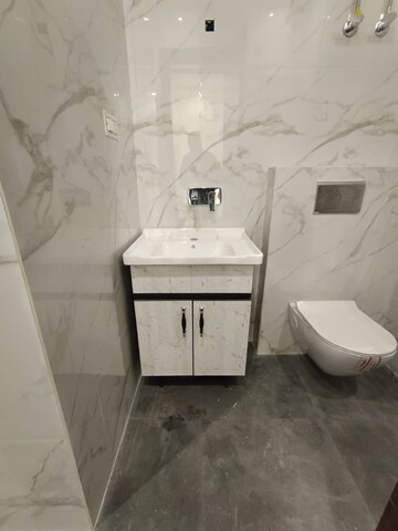 Bathroom in 2.5 BHK Apartment at Paschim Vihar – for Rent