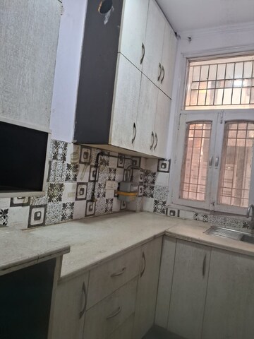 Kitchen in 2 BHK Apartment at Gaur Atulyam, Omicron I Greater Noida – for Rent
