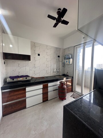 Kitchen in 2 BHK Apartment at LMS Finswell Woods, Viman Nagar – for Rent