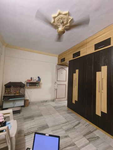 Living Room in 1 BHK Apartment at Raghu Vihar Apartments, Dahisar West – for Rent
