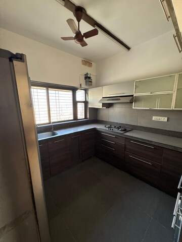 Kitchen in 5 BHK Apartment at Edenwoods Cedar CHS, Kolshet – for Sale