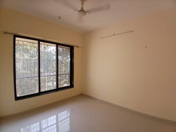 Room in 2 BHK Apartment at Bhoomi Flora, Borivali East – for Sale