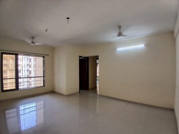 Room in 2 BHK Apartment at Bhoomi Flora, Borivali East – for Sale
