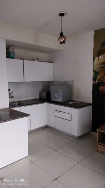 Kitchen in 1 BHK Apartment at Sunworld Arista, Sector 168 – for Rent