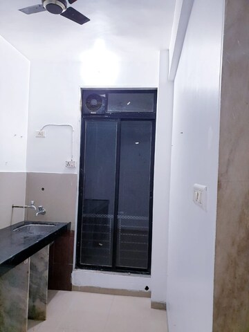 Kitchen in 1 RK Apartment at Kanha CHS, Kopar Khairane – for Sale