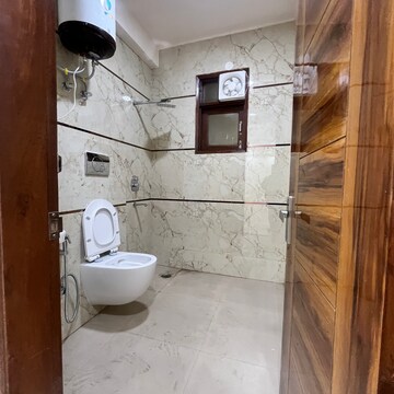 Bathroom in 3 BHK Builder Floor at Chattarpur – for Rent