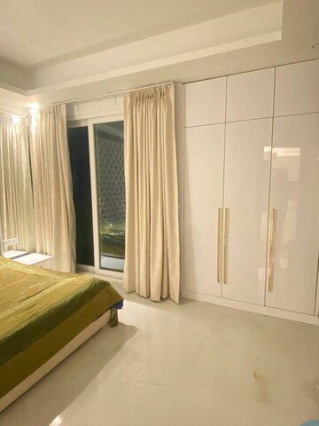 Living Room in 4 BHK Apartment at Mahagun Mezzaria, Sector 78 – for Rent