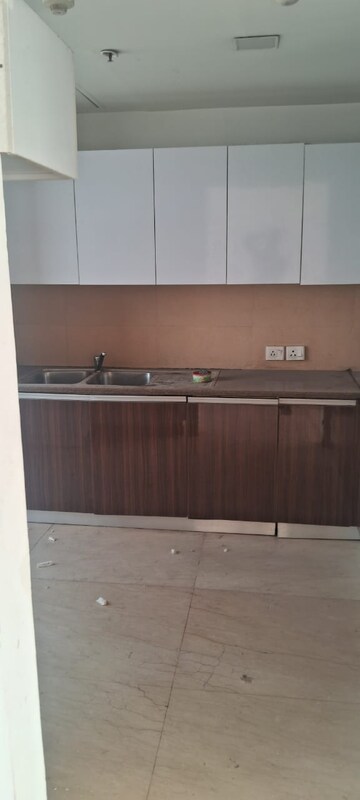 Kitchen in 4 BHK Apartment at Puri Diplomatic Greens Phase I, Sector 111 – for Rent