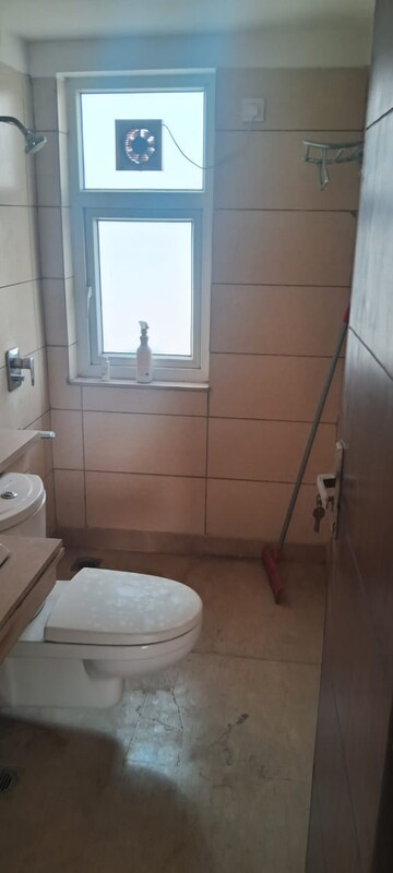 Bathroom in 4 BHK Apartment at Puri Diplomatic Greens Phase I, Sector 111 – for Rent