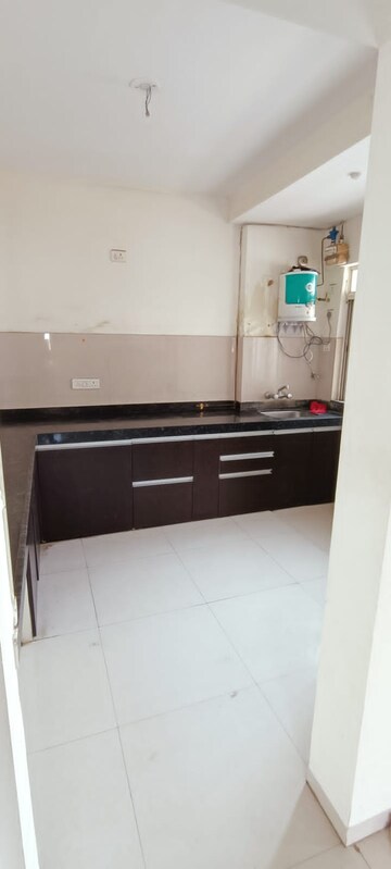 Kitchen in 2 BHK Apartment at Brahma Realty Skycity, Dhanori – for Rent