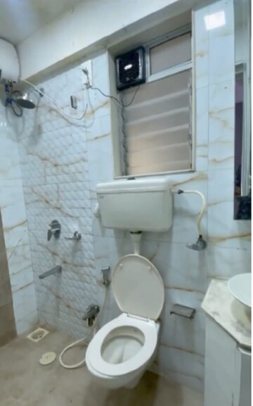 Bathroom in 2 BHK Apartment at Unique Signature Mumbai, Mira Road – for Rent
