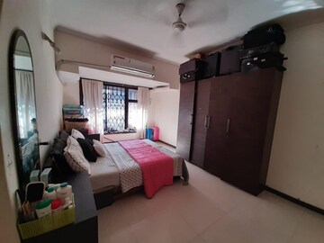 Bedroom in 2 BHK Apartment at Satellite Garden, Goregaon East – for Rent