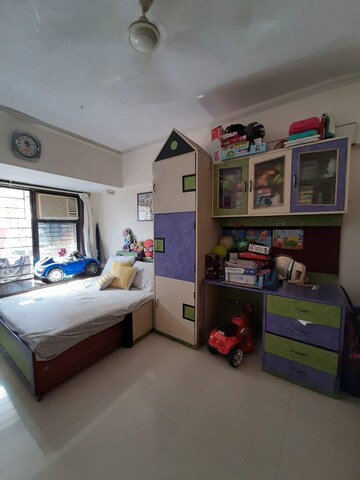 Bedroom in 2 BHK Apartment at Satellite Garden, Goregaon East – for Rent