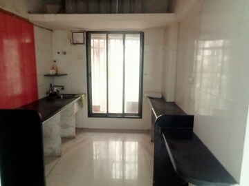 Kitchen in 2 BHK Apartment at Samarpan CHS, Mira Road – for Rent