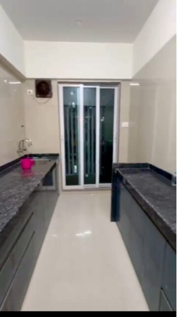 Kitchen in 2 BHK Apartment at Shree Ramdev Ritu Heights, Mira Road – for Rent
