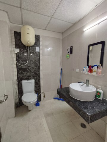 Bathroom in 3 BHK Apartment at Paramount Floraville, Sector 137 – for Rent