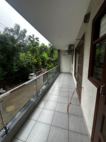 Balcony in 3 BHK Apartment at Ansal Sushant Lok I, Sector 43 – for Rent